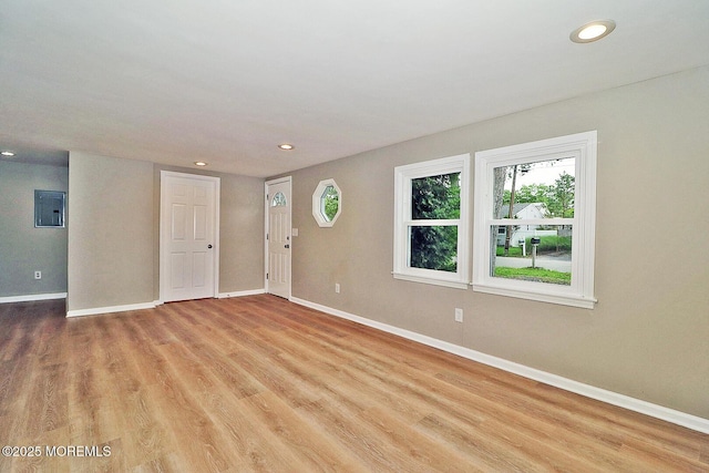 503 Center St, Forked River, NJ 08731 - unfurnished room with baseboards, recessed lighting, light wood finished floors, and electric panel