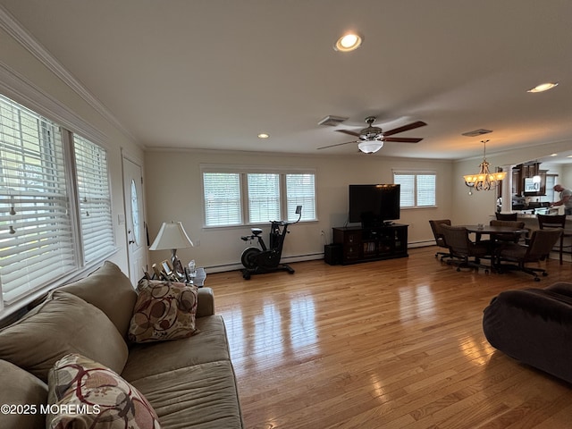 2 Corinth Pl, Toms River, NJ 08757 - living area with crown molding, light wood finished floors, a chandelier, a ceiling fan, and recessed lighting