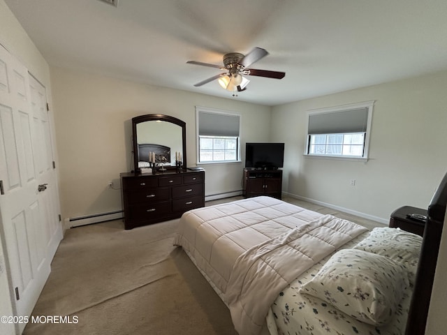 2 Corinth Pl, Toms River, NJ 08757 - bedroom featuring baseboard heating, multiple windows, and light carpet