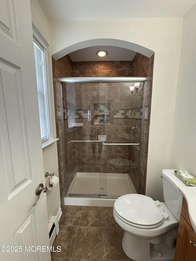 2 Corinth Pl, Toms River, NJ 08757 - bathroom with a baseboard heating unit, toilet, a shower stall, and vanity