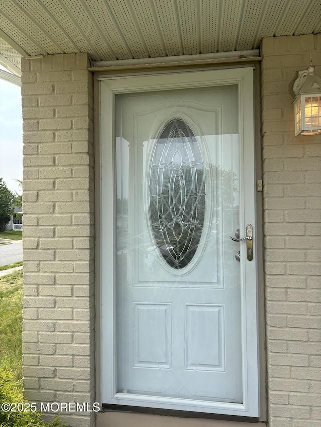 2 Corinth Pl, Toms River, NJ 08757 - entrance to property with brick siding