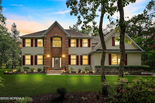 2 Kyle Ct, Jackson, NJ 08527 - view of front facade featuring a lawn and brick siding