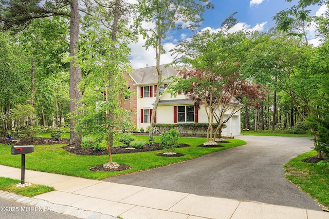2 Kyle Ct, Jackson, NJ 08527 - view of front of home featuring a garage, a front lawn, and asphalt driveway