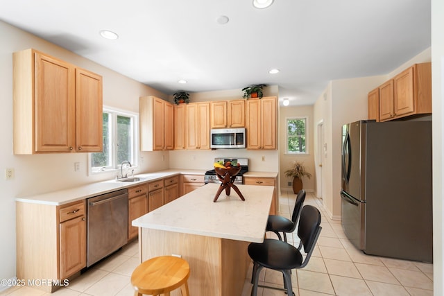 2 Kyle Ct, Jackson, NJ 08527 - kitchen with appliances with stainless steel finishes, a kitchen breakfast bar, healthy amount of natural light, a kitchen island, and recessed lighting