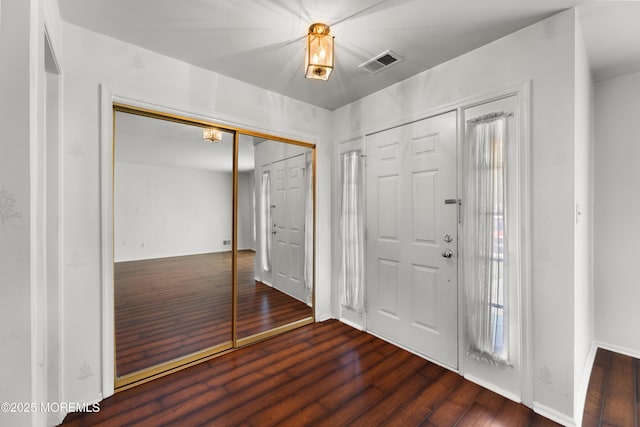 238 Larchwood Ct, Howell, NJ 07731 - entrance foyer featuring wood finished floors and baseboards