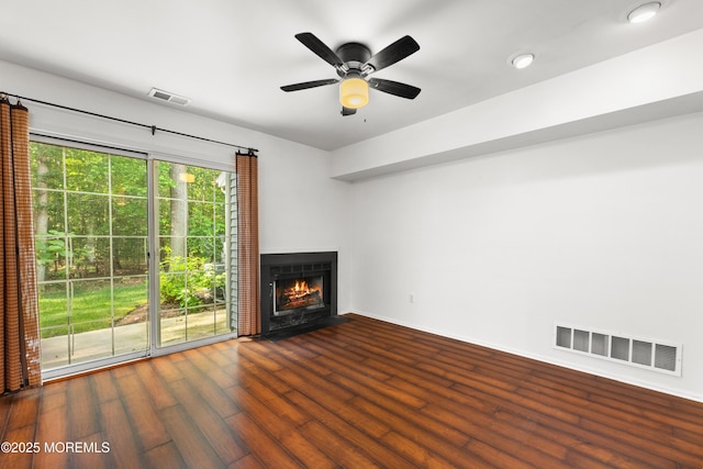 238 Larchwood Ct, Howell, NJ 07731 - unfurnished living room featuring wood finished floors, a fireplace with flush hearth, a ceiling fan, and baseboards