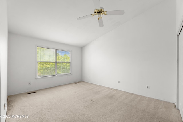 238 Larchwood Ct, Howell, NJ 07731 - spare room featuring light carpet, lofted ceiling, and ceiling fan