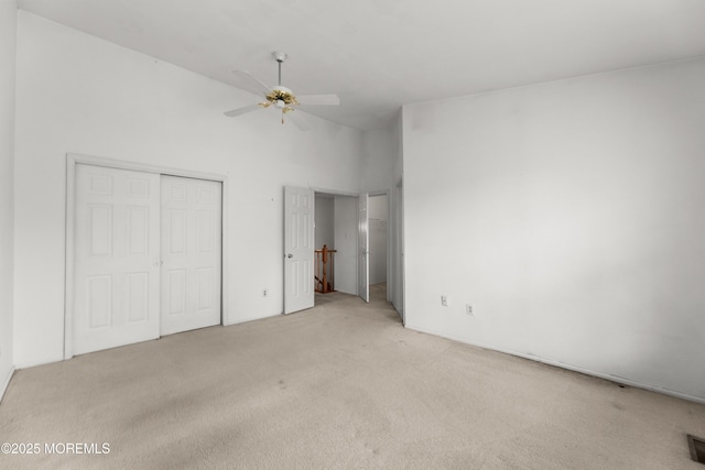 238 Larchwood Ct, Howell, NJ 07731 - unfurnished bedroom with light colored carpet, a closet, and a ceiling fan