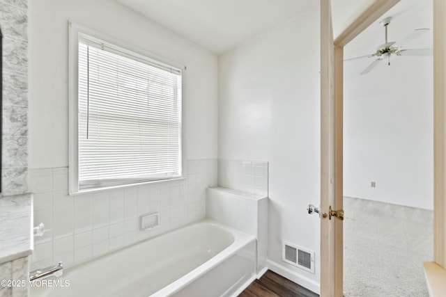 238 Larchwood Ct, Howell, NJ 07731 - bathroom with a garden tub, plenty of natural light, and a ceiling fan