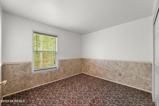 238 Larchwood Ct, Howell, NJ 07731 - carpeted spare room featuring a wainscoted wall