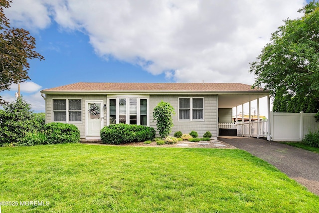 5 E Jack St, Hazlet, NJ 07730 - view of front facade featuring asphalt driveway, an attached carport, and roof with shingles