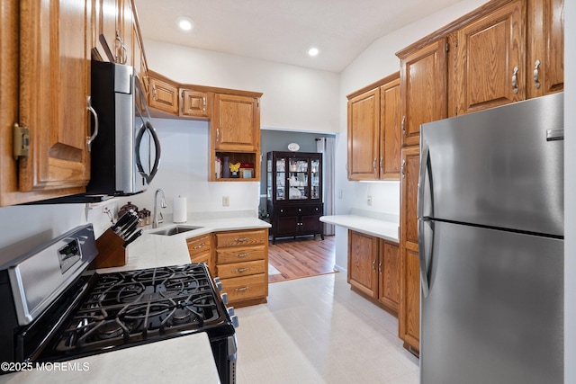 5 E Jack St, Hazlet, NJ 07730 - kitchen with stainless steel appliances, a sink, light countertops, brown cabinetry, and recessed lighting