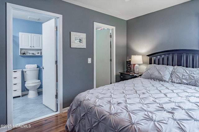 5 E Jack St, Hazlet, NJ 07730 - bedroom featuring light wood-type flooring and ensuite bath