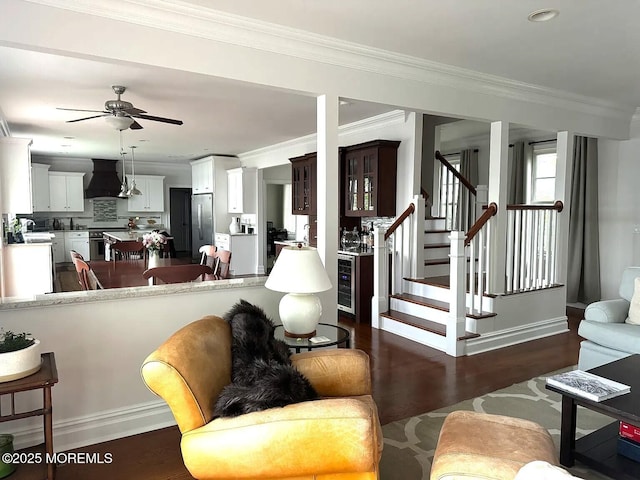 443 Driveway, Oceanport, NJ 07757 - living area featuring ornamental molding, a ceiling fan, dark wood-style floors, wine cooler, and stairs