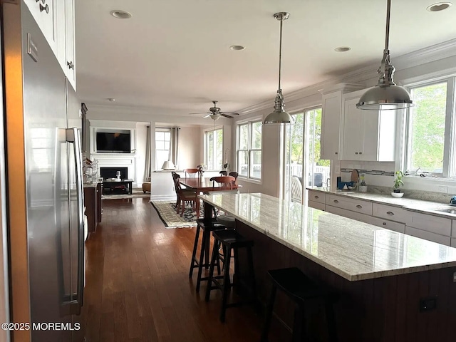 443 Driveway, Oceanport, NJ 07757 - kitchen featuring stainless steel refrigerator, open floor plan, ceiling fan, light stone countertops, and crown molding