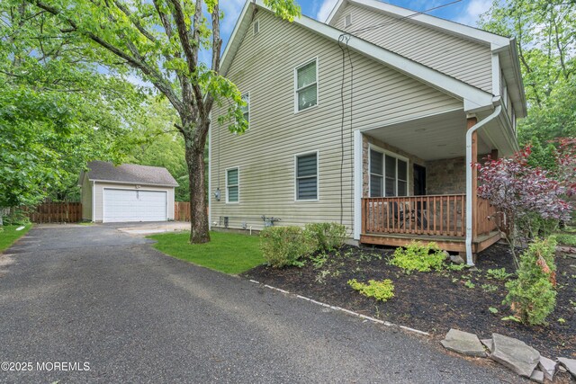 137 Willow Dr, Jackson, NJ 08527 - view of side of home featuring an outbuilding and a garage