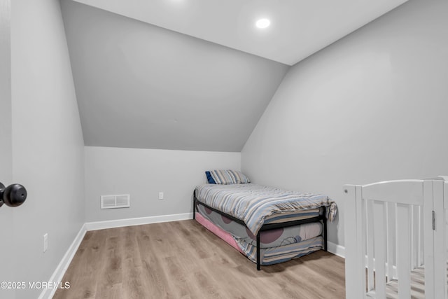 137 Willow Dr, Jackson, NJ 08527 - bedroom with wood finished floors, vaulted ceiling, and baseboards