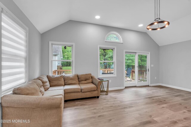 137 Willow Dr, Jackson, NJ 08527 - living area featuring vaulted ceiling, light wood finished floors, recessed lighting, and baseboards