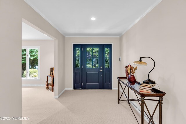 2627 Ramshorn Dr, Manasquan, NJ 08736 - foyer entrance with crown molding, light colored carpet, and recessed lighting