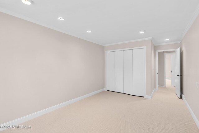 2627 Ramshorn Dr, Manasquan, NJ 08736 - unfurnished bedroom featuring light colored carpet, recessed lighting, crown molding, and a closet