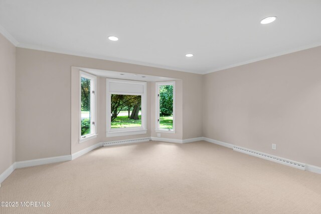 2627 Ramshorn Dr, Manasquan, NJ 08736 - spare room featuring a baseboard heating unit, light carpet, crown molding, and recessed lighting