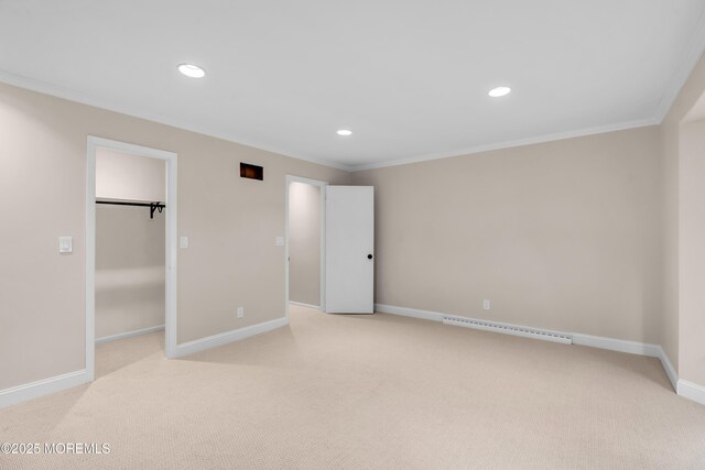 2627 Ramshorn Dr, Manasquan, NJ 08736 - unfurnished bedroom featuring crown molding, light carpet, a baseboard radiator, a spacious closet, and recessed lighting