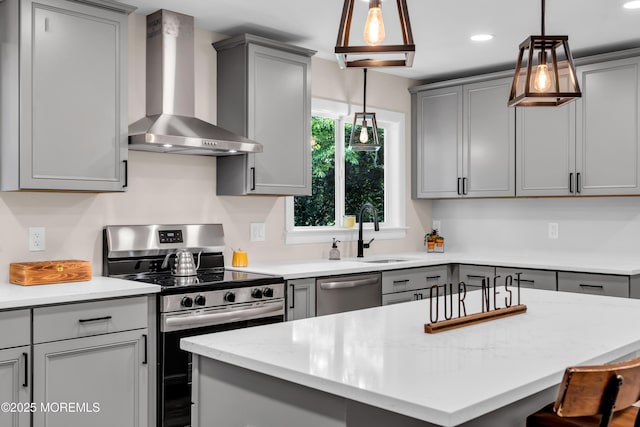 2627 Ramshorn Dr, Manasquan, NJ 08736 - kitchen featuring wall chimney exhaust hood, stainless steel appliances, gray cabinets, pendant lighting, and recessed lighting