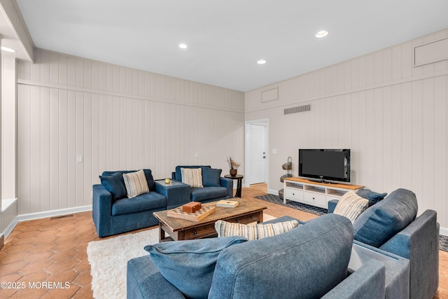 2627 Ramshorn Dr, Manasquan, NJ 08736 - living room featuring recessed lighting and a decorative wall