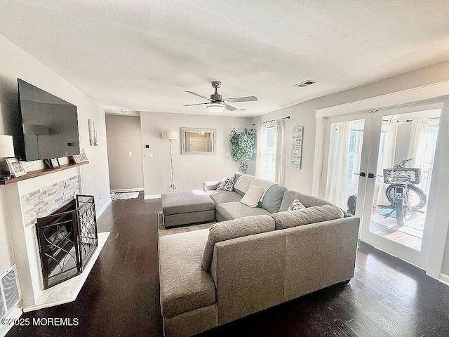 167 Frontier Way, Tinton Falls, NJ 07753 - living room featuring plenty of natural light, dark wood-style flooring, ceiling fan, and baseboards