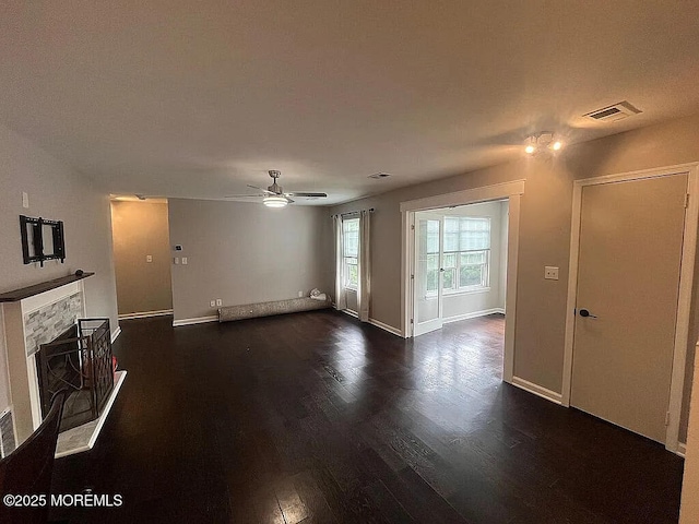 167 Frontier Way, Tinton Falls, NJ 07753 - unfurnished living room with dark wood finished floors, a ceiling fan, and baseboards