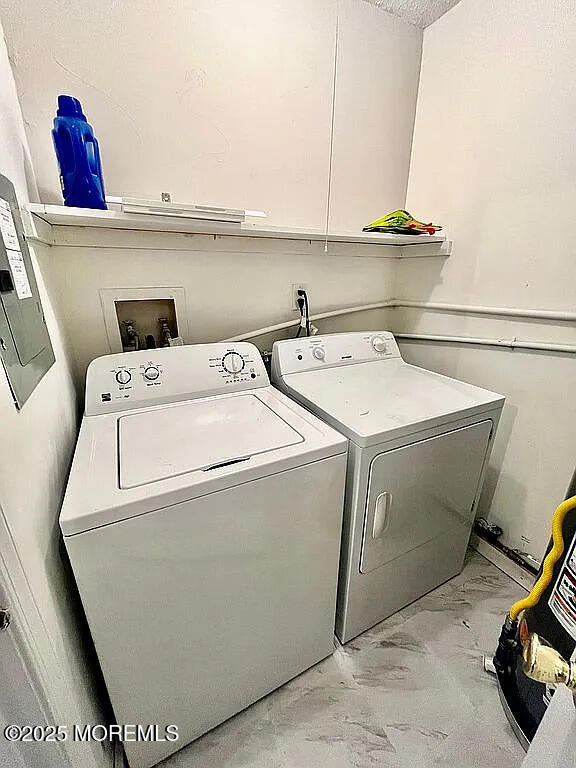 167 Frontier Way, Tinton Falls, NJ 07753 - washroom with washer and clothes dryer and light marble finish floors