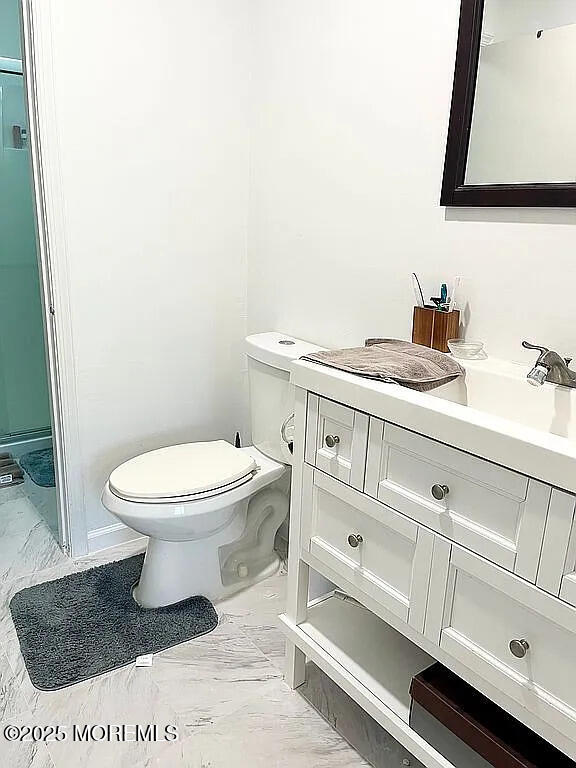 167 Frontier Way, Tinton Falls, NJ 07753 - bathroom with vanity, toilet, and marble finish floors