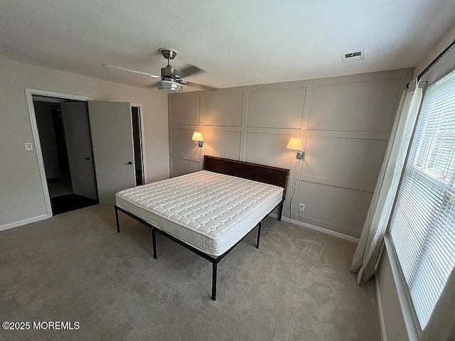 167 Frontier Way, Tinton Falls, NJ 07753 - bedroom featuring light colored carpet, a decorative wall, a closet, and ceiling fan