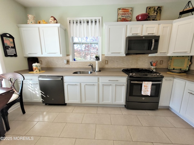 63 Briarwood Dr, Little Egg Harbor, NJ 08087 - kitchen featuring black microwave, stainless steel range with gas stovetop, dishwasher, tasteful backsplash, and a sink
