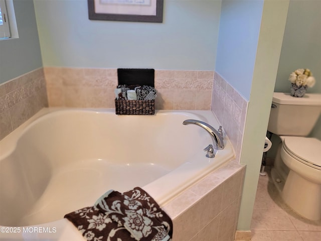 63 Briarwood Dr, Little Egg Harbor, NJ 08087 - bathroom featuring toilet, tile patterned floors, and a bath