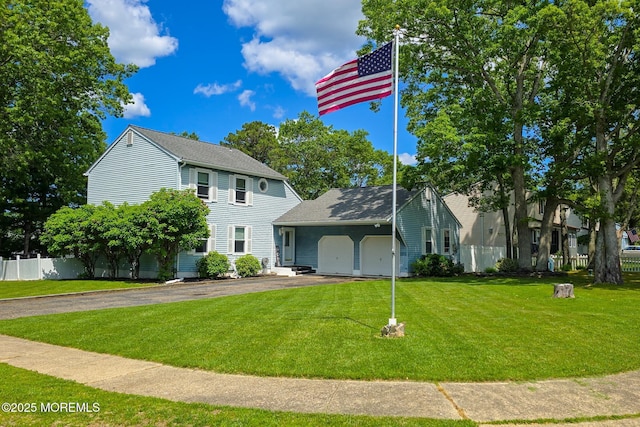 1 Lafayette Ct, Barnegat, NJ 08005 - colonial-style house with an attached garage and asphalt driveway