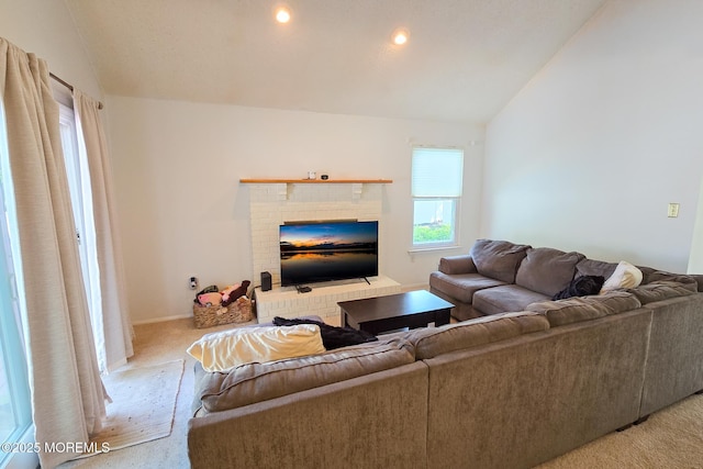 1 Lafayette Ct, Barnegat, NJ 08005 - living area featuring lofted ceiling, light carpet, a fireplace, and baseboards