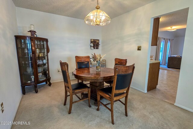 1 Lafayette Ct, Barnegat, NJ 08005 - dining space featuring a chandelier, carpet flooring, a textured ceiling, and baseboards