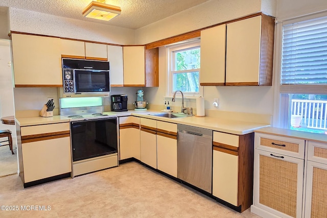 1 Lafayette Ct, Barnegat, NJ 08005 - kitchen with range with electric stovetop, stainless steel dishwasher, black microwave, a sink, and a textured ceiling