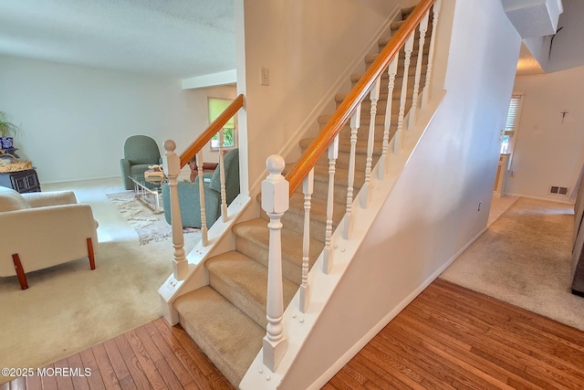 1 Lafayette Ct, Barnegat, NJ 08005 - staircase with wood finished floors and baseboards