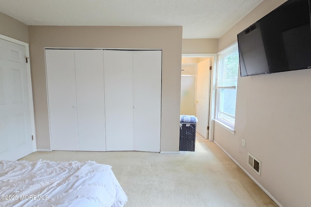 1 Lafayette Ct, Barnegat, NJ 08005 - bedroom featuring a closet, light colored carpet, and baseboards