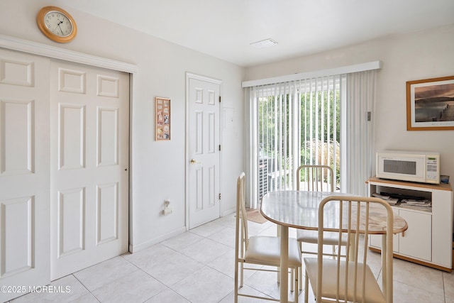 27 Sawmill Rd, Brick, NJ 08724 - dining space with light tile patterned floors and baseboards
