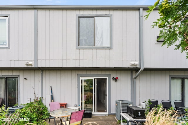 27 Sawmill Rd, Brick, NJ 08724 - back of house with central air condition unit and a patio area