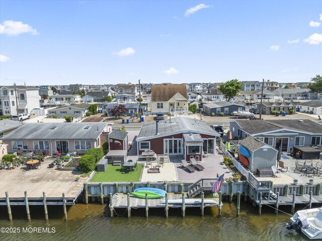 68 Gregg Dr, Beach Haven West, NJ 08050 - aerial perspective of suburban area with a large body of water