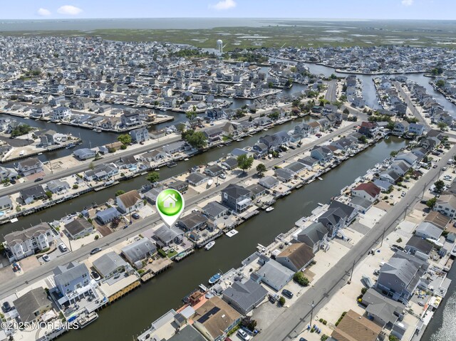 68 Gregg Dr, Beach Haven West, NJ 08050 - aerial view of property's location with nearby suburban area and a large body of water