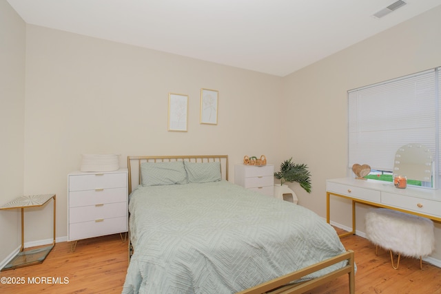 511 Coppola Dr, South Plainfield, NJ 07080 - bedroom with wood finished floors and baseboards