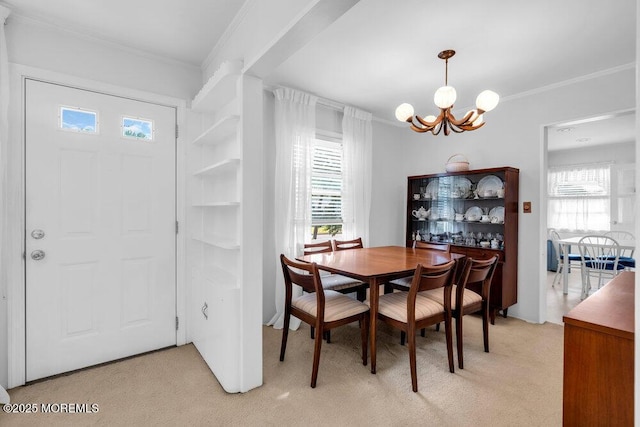 361 Meadowbrook Ave, Eatontown, NJ 07724 - dining area featuring light colored carpet, a chandelier, healthy amount of natural light, and ornamental molding