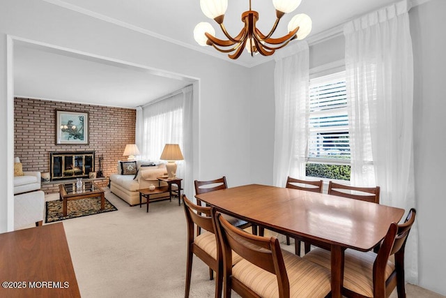 361 Meadowbrook Ave, Eatontown, NJ 07724 - dining area with a chandelier, light colored carpet, a fireplace, and crown molding