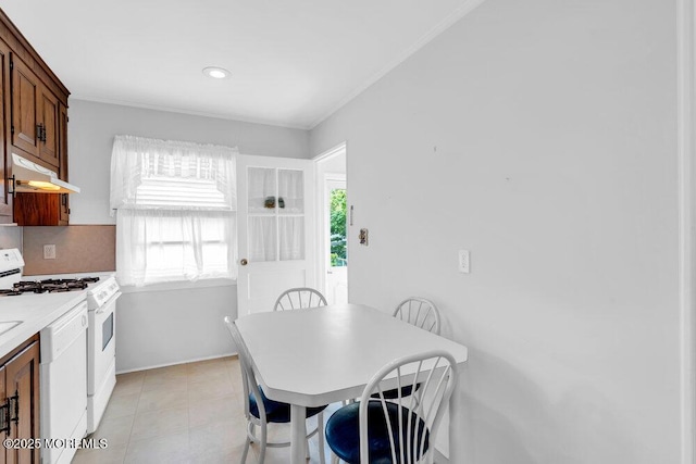 361 Meadowbrook Ave, Eatontown, NJ 07724 - kitchen featuring white appliances, under cabinet range hood, light countertops, baseboards, and ornamental molding