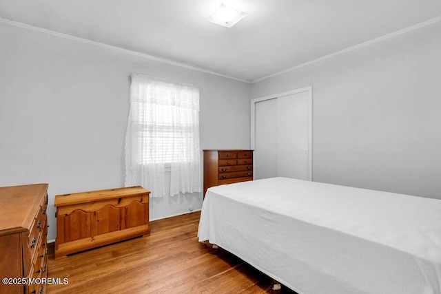 361 Meadowbrook Ave, Eatontown, NJ 07724 - bedroom with ornamental molding, wood finished floors, and a closet